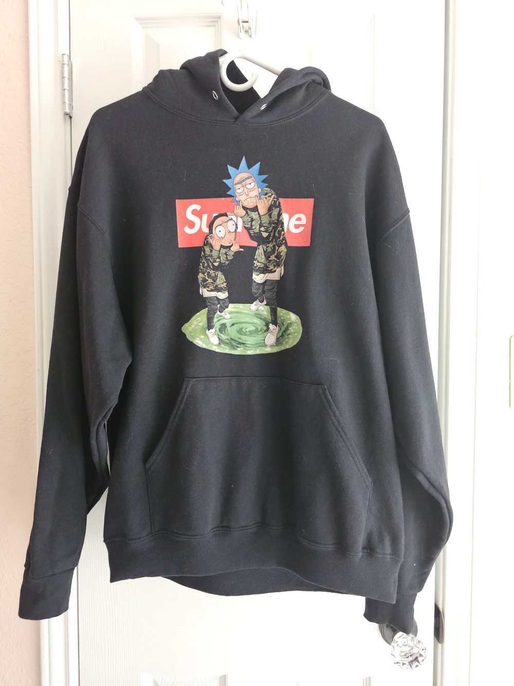 Jerzees Black Crewneck Hoodie with Cartoon Graphic and Red Box Logo